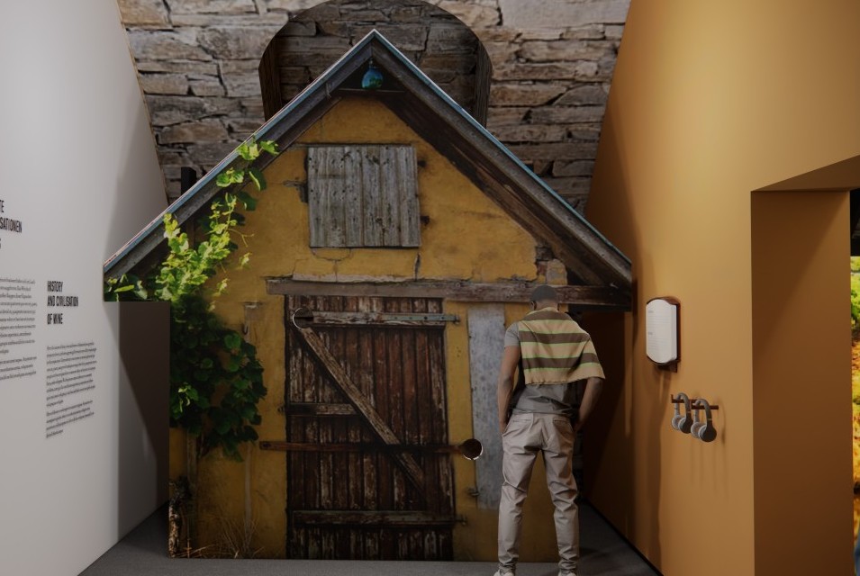 Mann vor Weinberg Hütte